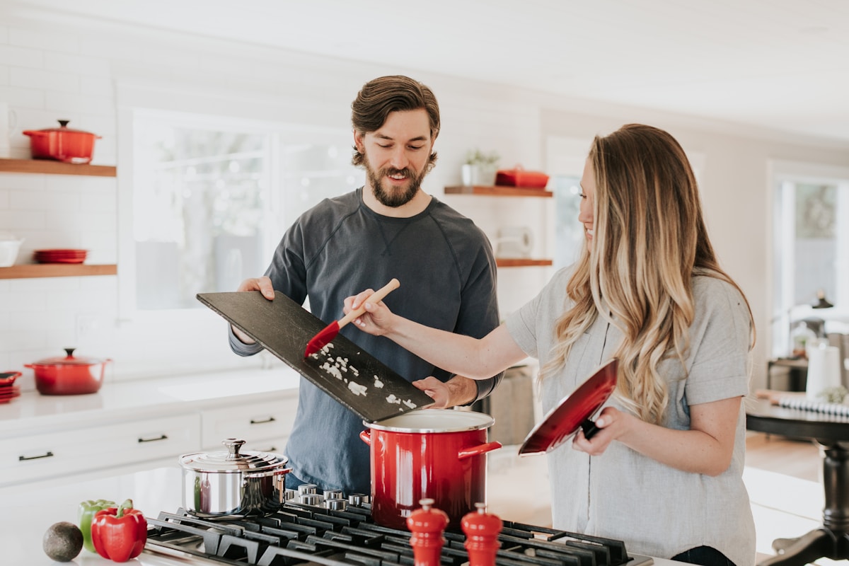 NDIS participant in a purpose-built accessible kitchen in an SDA home